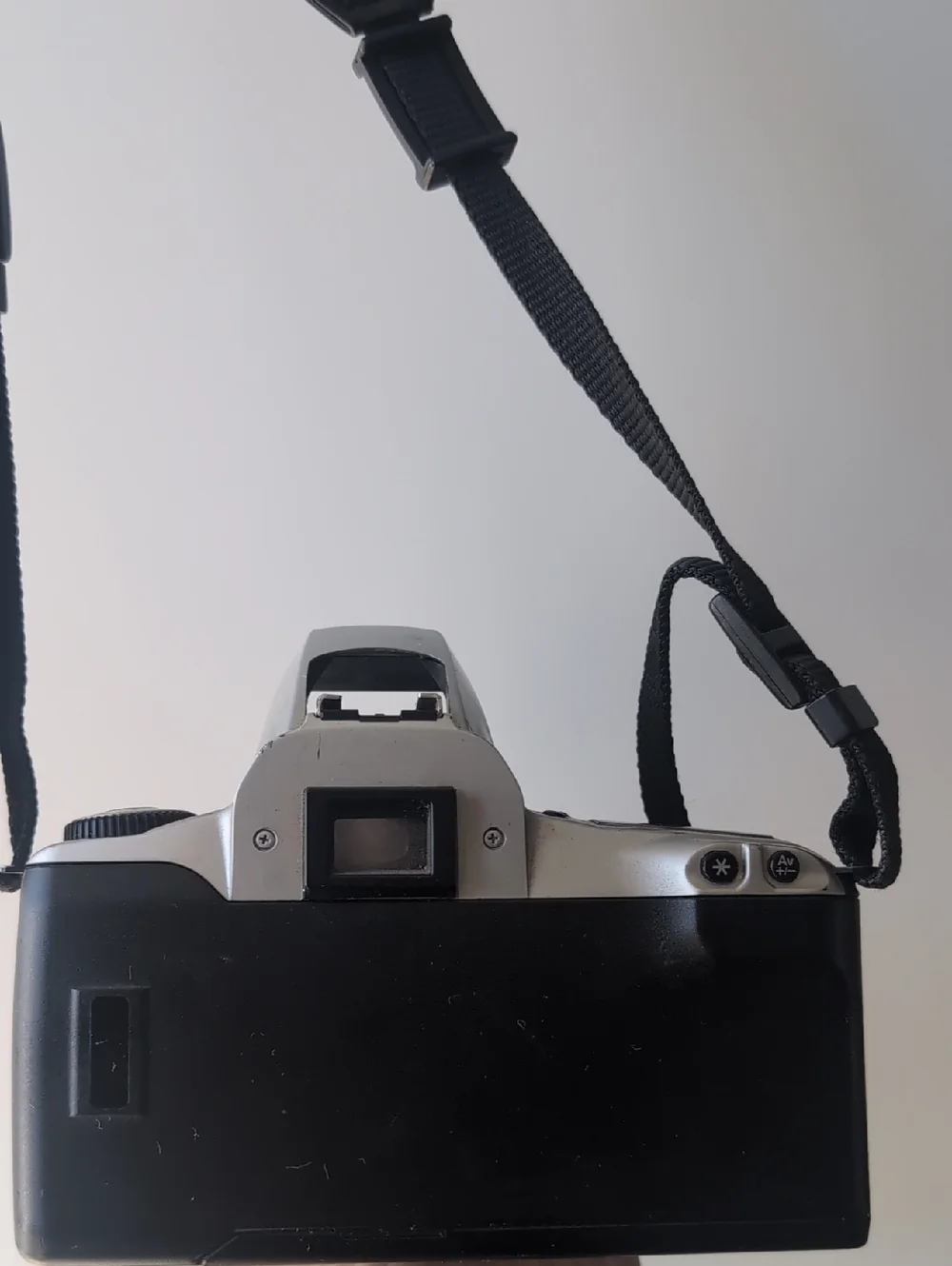 Vintage Canon Silver and Black Camera with Zoom Lens